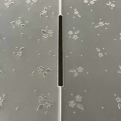 Embossingplaat opengevouwen.