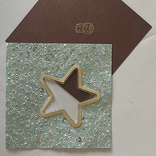 Voorplat met schutster en gouden rand