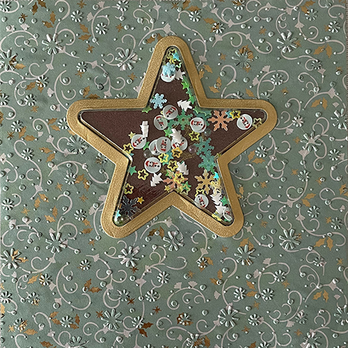 Voorplat met schutster en gouden rand