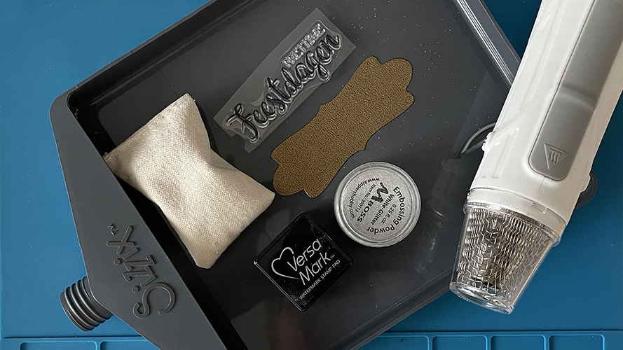 Embossing powder benodigdheden.